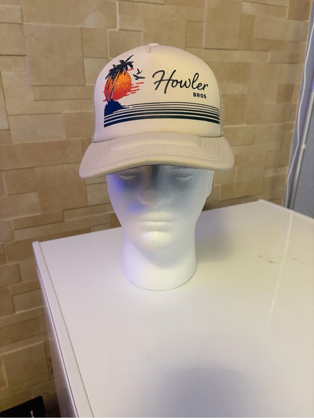 Howler Brothers Cream Trucker Hat with Orange Sunset and Navy Graphic